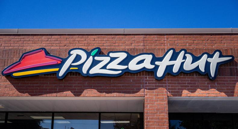 Two Pizza Hut franchisees in California are among those who are laying off workers. Brandon Bell/Getty Images