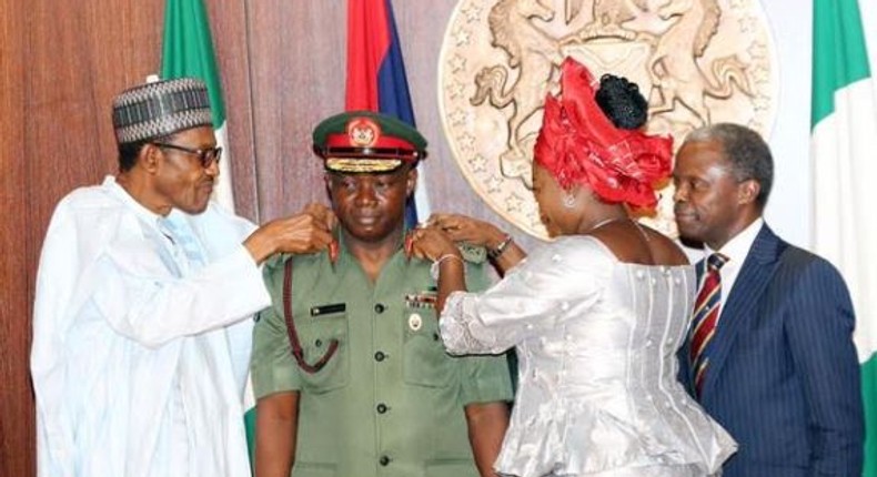 President Muhammadu Buhari decorates new service chiefs on August 13, 2015.