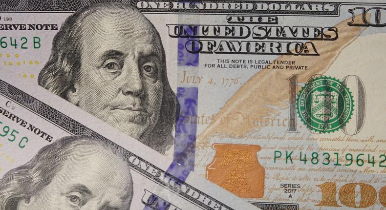 100 dollar bills seen displayed.(Photo Illustration by Sheldon Cooper/SOPA Images/LightRocket via Getty Images)