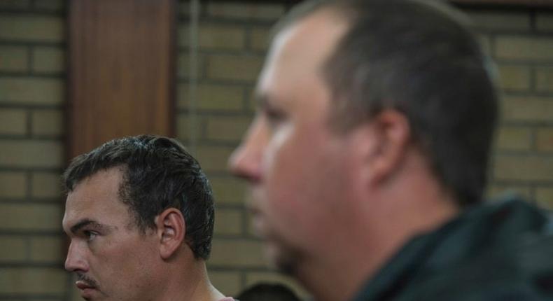 Willem Oosthuizen (right) and Theo Martins Jackson face charges of kidnapping and assaulting a colleague as they appeared at the Middleburg Magistrate Court on November 16, 2016