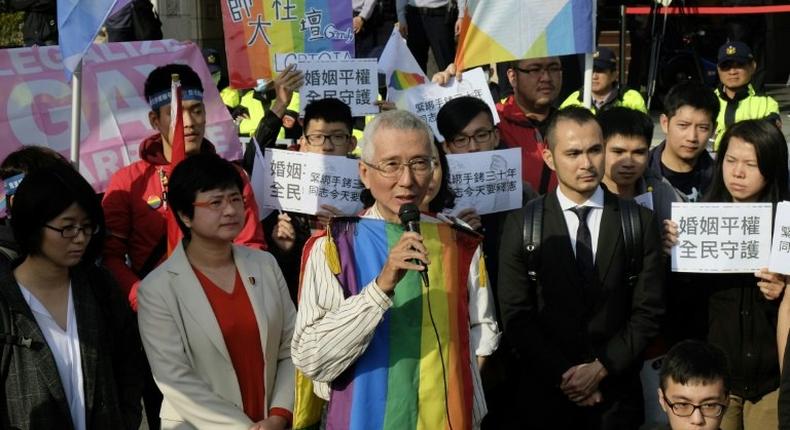 Veteran gay rights activist Chi Chia-wei declared himself cautiously optimistic as the constitutional court began hearing a landmark case that could make Taiwan the first place in Asia to allow same-sex marriage