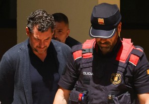 Džonatan Andik, 43 (levo) pritvoren je 19. maja 2026. | Foto: Reuters