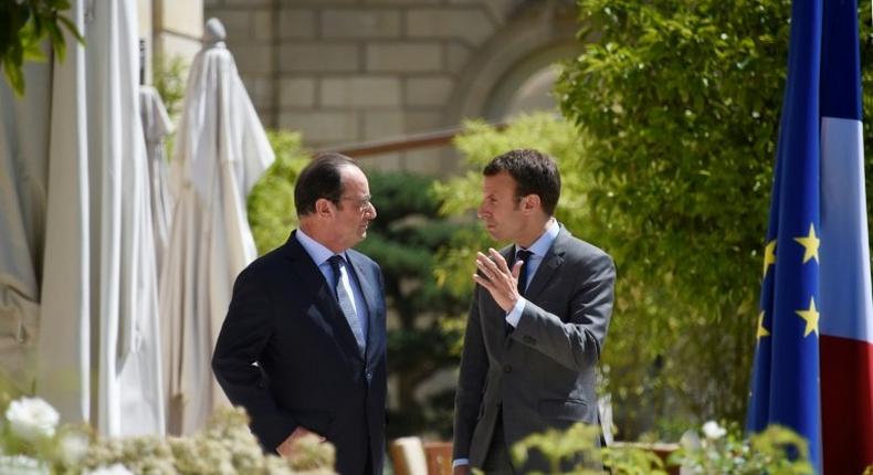 French President Francois Hollande (L), seen with now-presidential candidate Emmanuel Macron in 2015, said of possible campaign hacks, We knew that there were these risks during the presidential campaign because it happened elsewhere