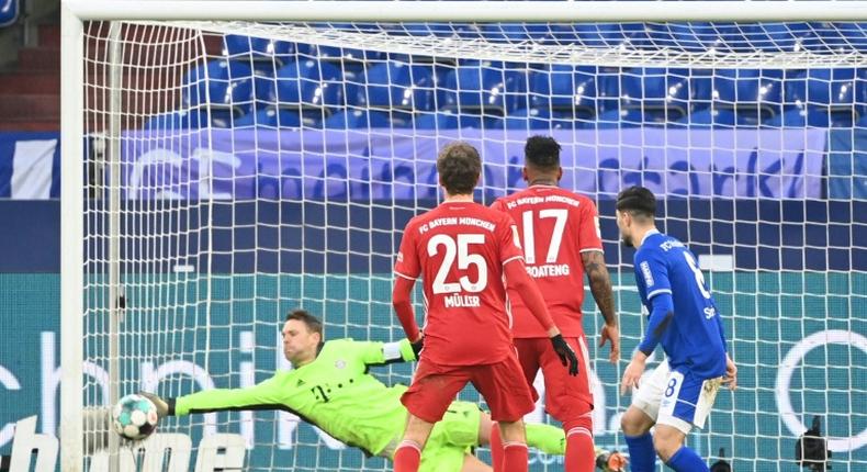 Neuer makes a save against Schalke on Sunday