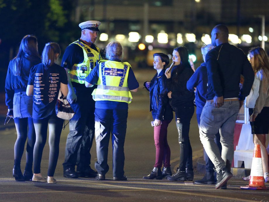 Police and fans close to the Manchester Arena.