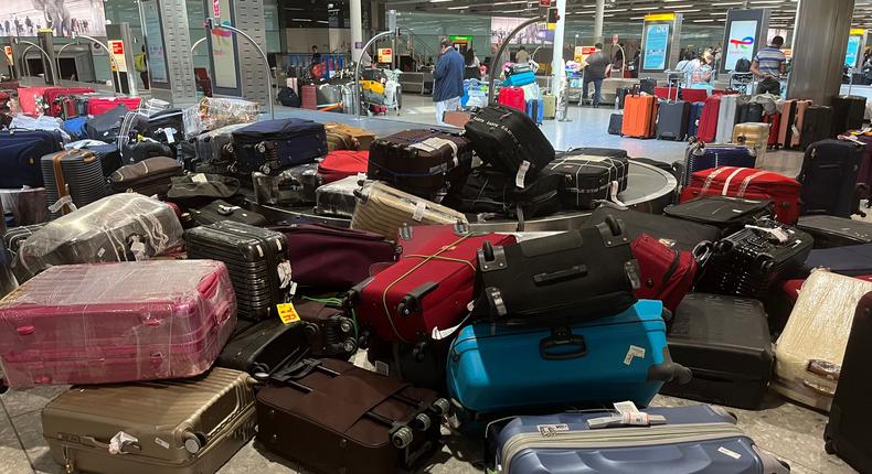 Uncollected suitcases at London Heathrow Airport on July 8, 2022.