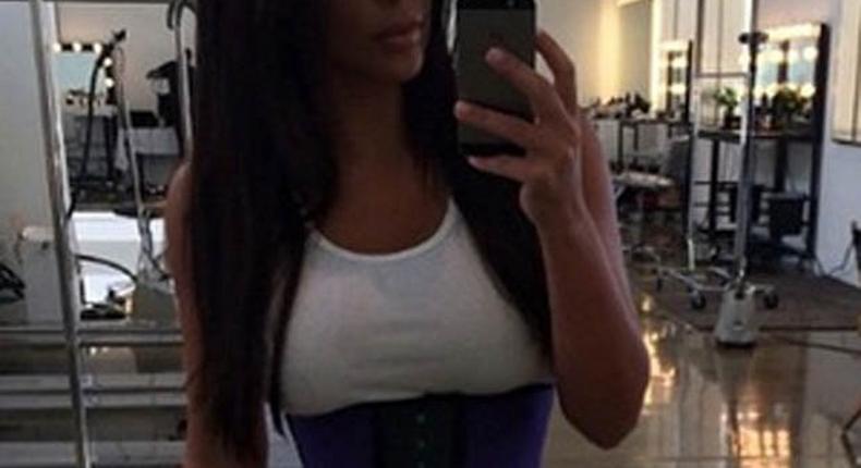 Kim Kardashian rocking waist trainer after pregnancy