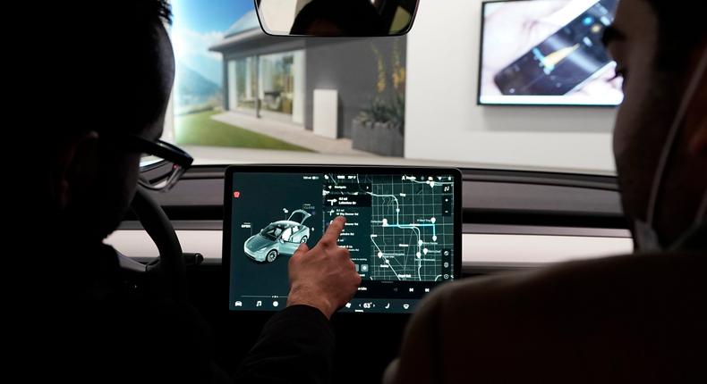 Tesla is giving a way a month of free Full Self-Driving.Carlos Osorio