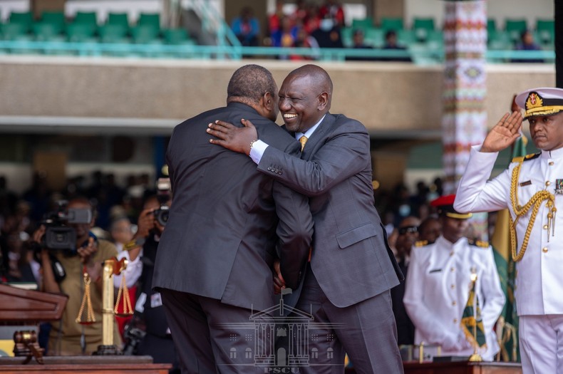 President William Ruto embraces former President Uhuru Kenyatta during the 5th president's inauguration at the Kasarani Stadium on September 13, 2022