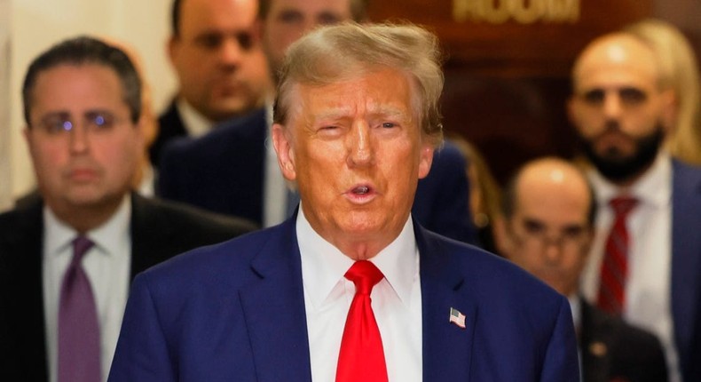 Former U.S. President Donald Trump speaks as he exits the courtroom for a break during his civil fraud trial at New York Supreme Court.Michael M. Santiago/Getty Images