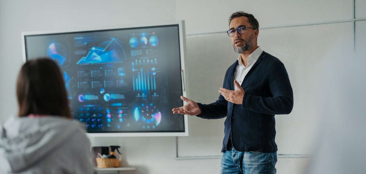 Teacher,Teaching,In,High,School,Classroom.