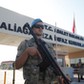 A Turkish soldier stands guard in front of the Aliaga Prison and Courthouse complex in Izmir