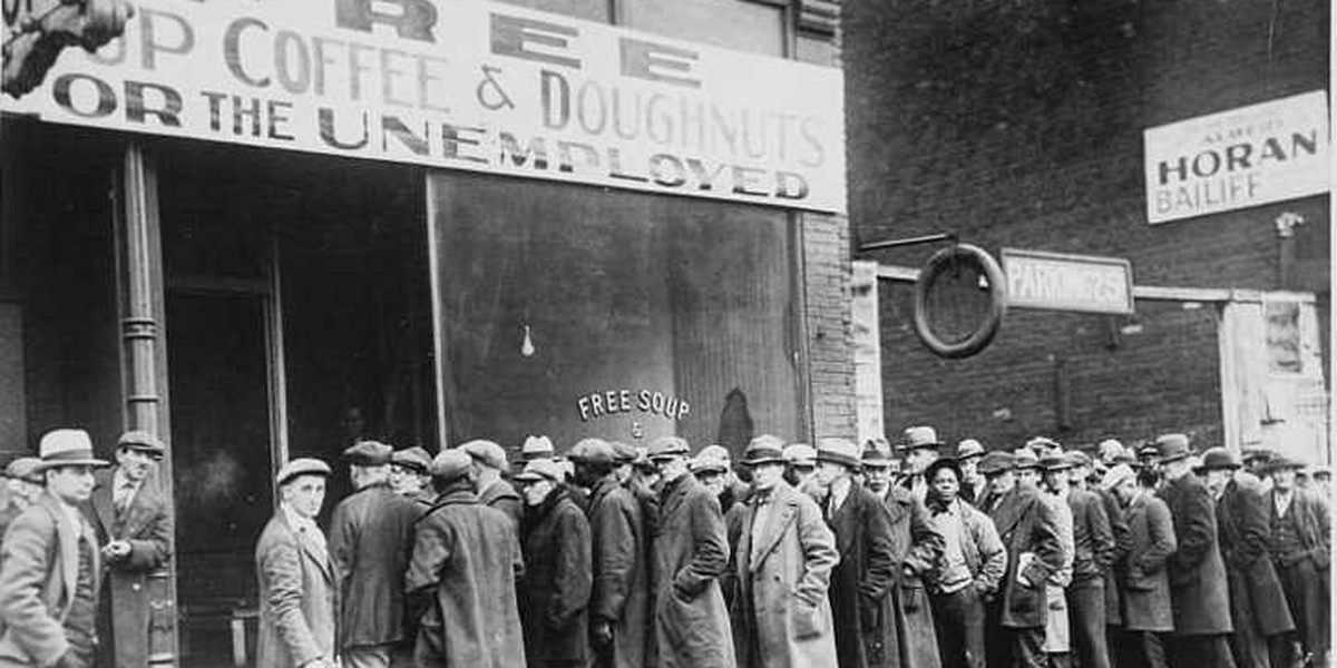 Unemployed men queued outside a depression soup kitchen during the Great Depression.