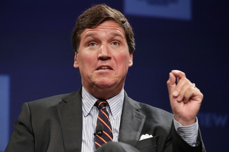 Prezenter telewizyjny Fox News Tucker Carlson podczas National Review Institute's Ideas Summit w Mandarin Oriental Hotel w Waszyngtonie, USA, 29 marca 2019 r.