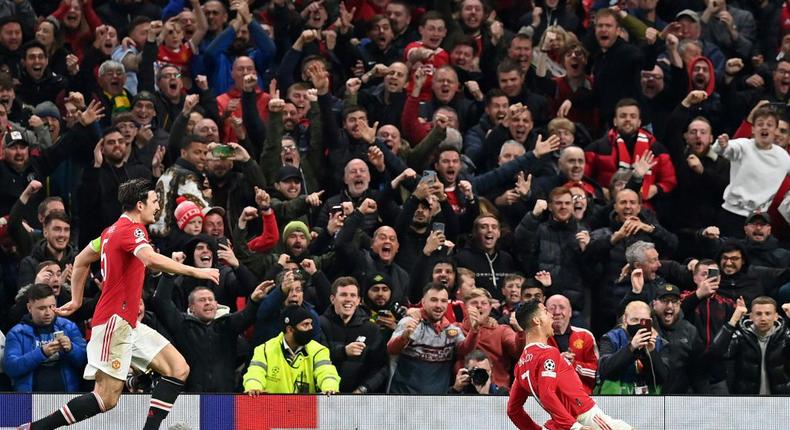 Cristiano Ronaldo (right) scored a late Manchester United winner for the second consecutive Champions League game Creator: Paul ELLIS