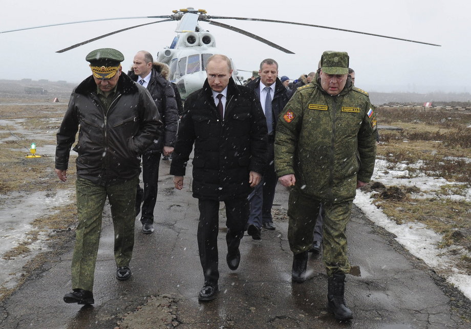 Russian President Vladimir Putin attends military exercises at a firing ground in Kirillovsky, Russia, in 2014.