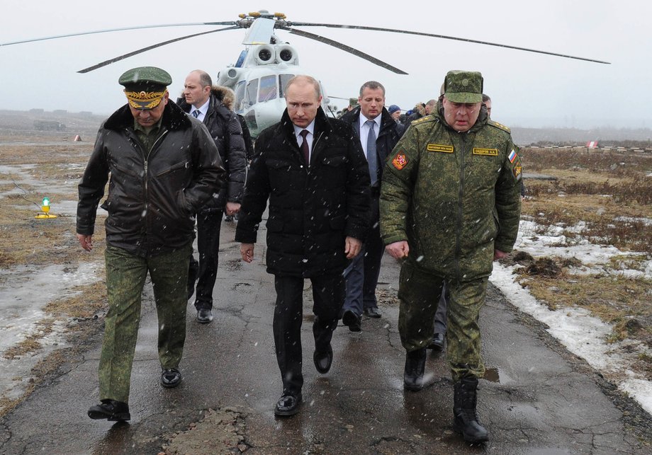 Russian President Vladimir Putin attends military exercises at a firing ground in Kirillovsky, Russia, in 2014.