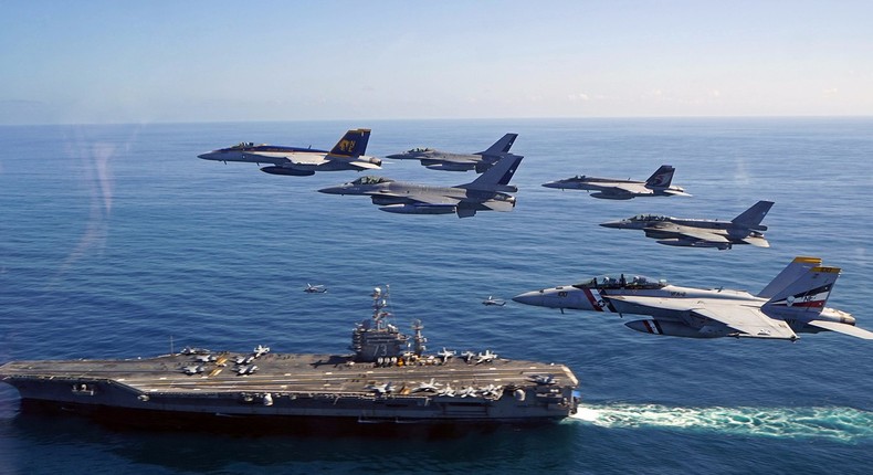 aircraft carrier fly by f-18 f 18