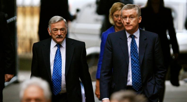 RBS former Chairman Tom McKillop (L) and ex-CEO Fred Goodwin arrive for the RBS shareholders meeting in Edinburgh, Scotland November 20, 2008.