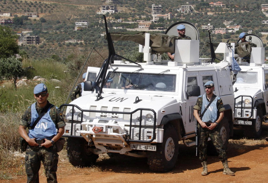 UNIFIL peacekeepers monitor the Lebanese-Israeli border at the southern Lebanese village of Kfar Kila, May 27, 2013.