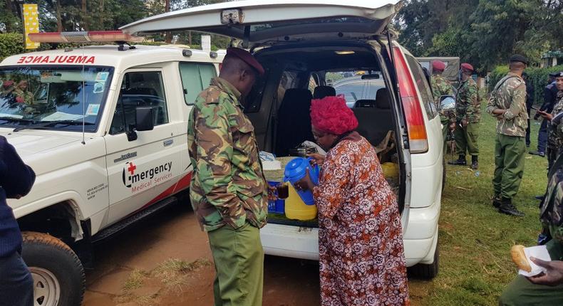 Kenyan woman serves tea to the police in the wake of the Riverside terror attack (Photo courtesy)