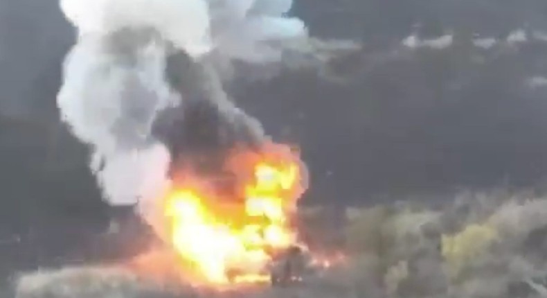 Screenshot of footage showing a Ukrainian dragon drone attacking a Russian tank.30th Mechanized Brigade