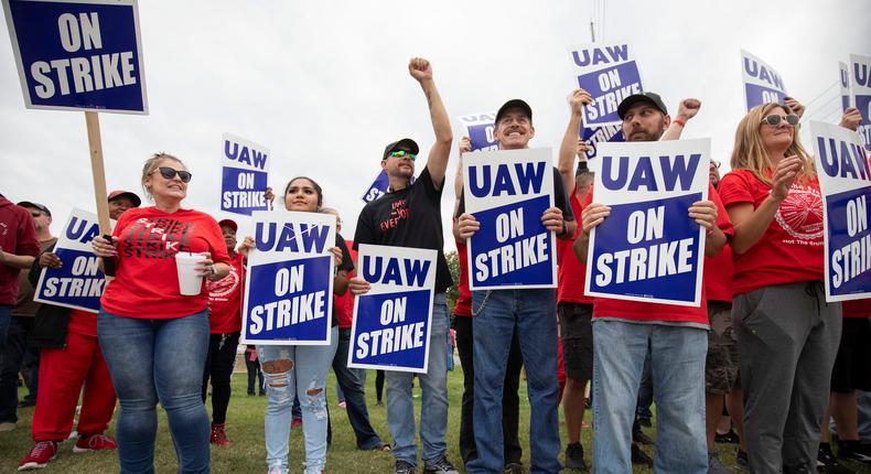 United Auto Workers members strike the General Motors Lansing Delta Assembly Plant on September 29.Bill Pugliano/Getty Images