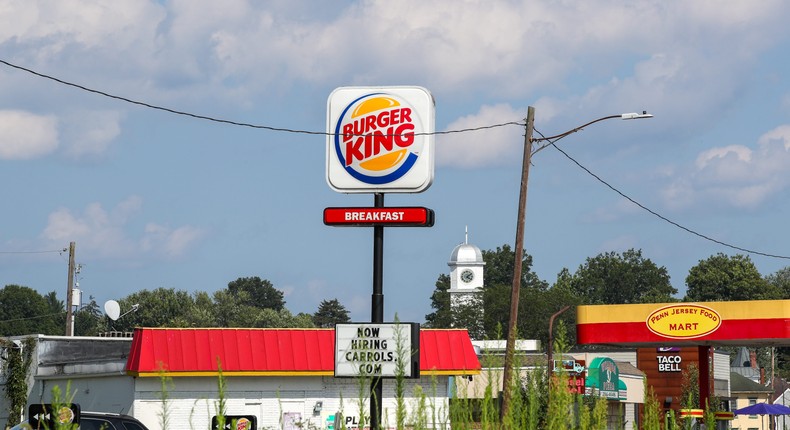 Restaurants are putting up prices, cutting staff's hours, and turning to tech to offset the new minimum wage for fast-food workers.Paul Weaver/SOPA Images/LightRocket via Getty Images