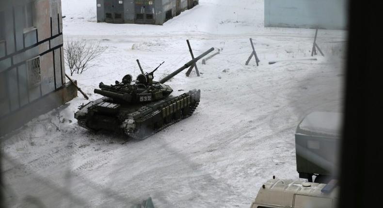 A tank from the Ukrainian Forces is stationed outside a building in the flashpoint eastern town of Avdiivka on February 2, 2017