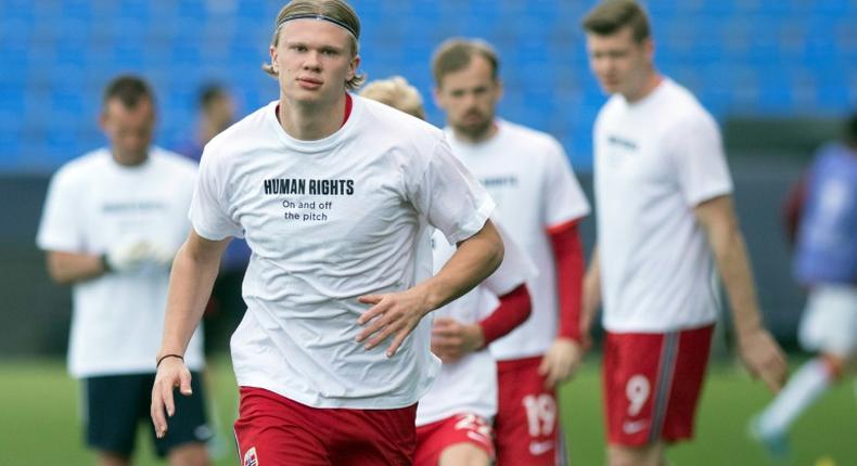 Norway star Erling Braut Haaland wearing a t-shirt with the slogan 'Human rights, on and off the pitch' before his team's World Cup qualifier against Turkey