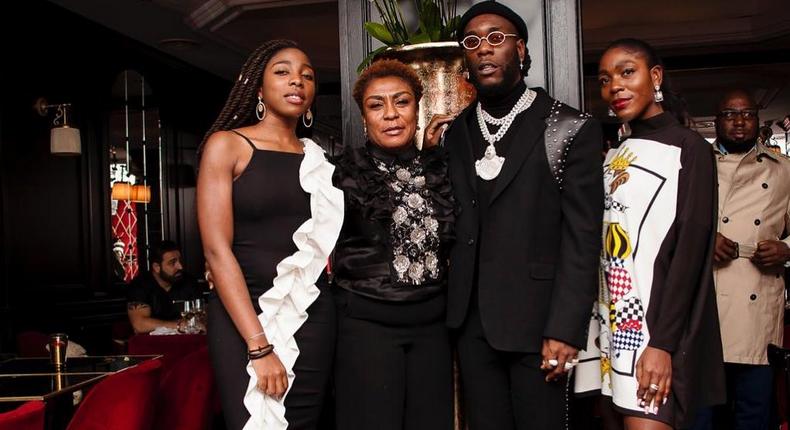 Nigerian music star Burna Boy, his mum, Bose Ogulu and his sisters [Instagram/NissiNation]