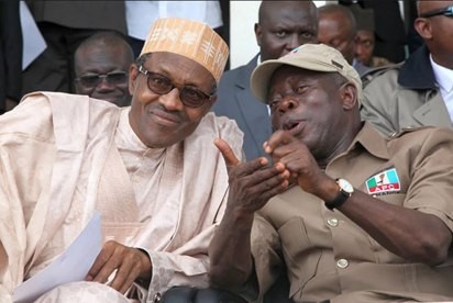 President Muhammadu Buhari has been forced to deny allegations that he shields close associates, like Adams Oshiomhole (right), from the law 