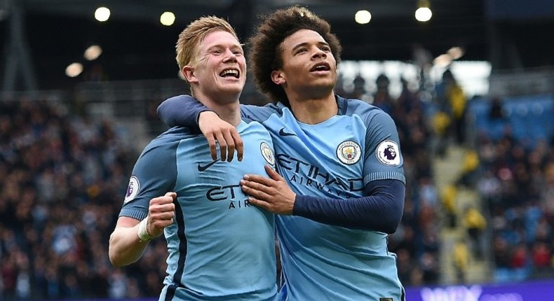 Manchester City's Kevin De Bruyne (L) celebrates after scoring a goal during their English Premier League match against Crystal Palace, at the Etihad Stadium in Manchester, on May 6, 2017