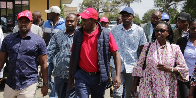 Laikipia Governor Ndiritu Muriithi (centre) with Martha Karua during a campaign rally in Nanyuki
