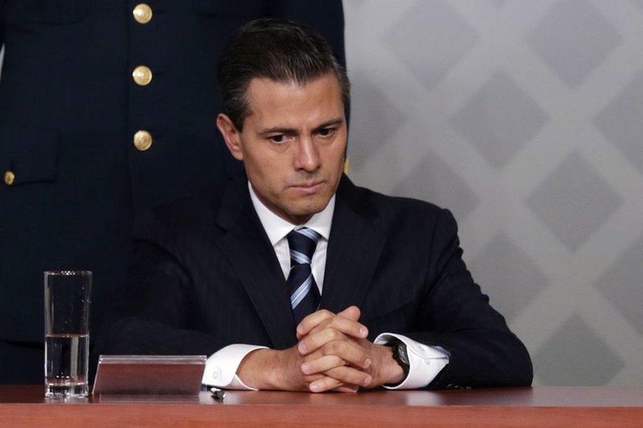 Mexico's President Enrique Pena Nieto sits during a meeting with lawyers in Mexico City