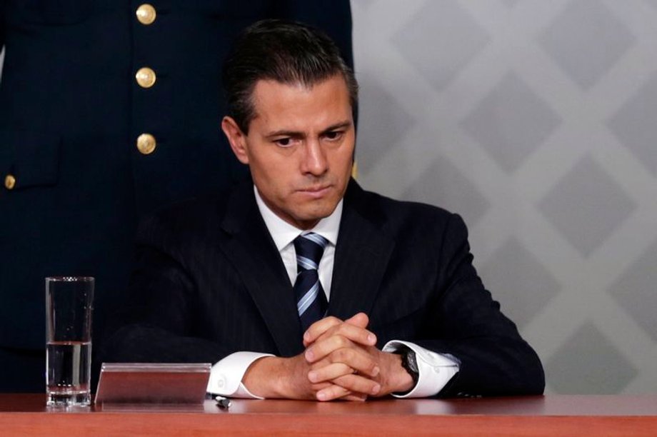 Mexico's President Enrique Pena Nieto sits during a meeting with lawyers in Mexico City