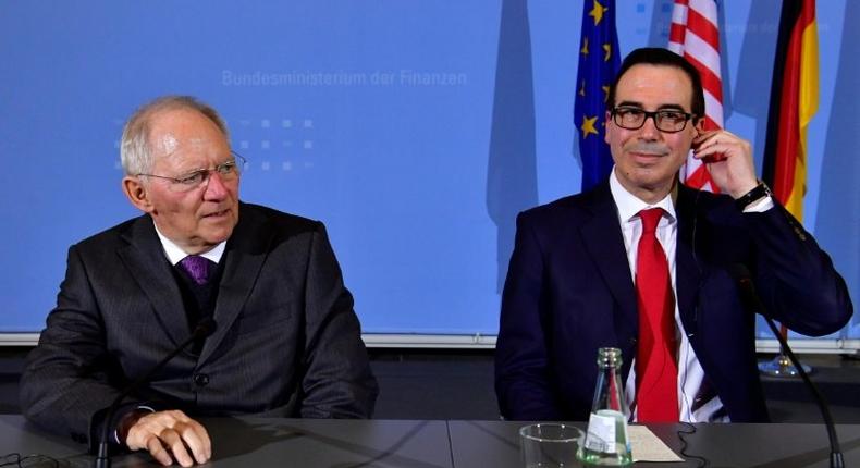 German Finance Minister Wolfgang Schaeuble (L) and US Secretary of the Treasury Steven Mnuchin attend a press conference at the finance ministry in Berlin