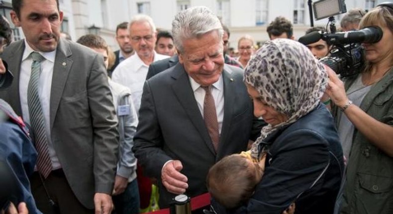 German president warns of limits to number of refugees