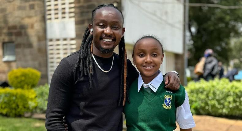 DJ Moh Spice and his daughter during her admission to Alliance Girls High School