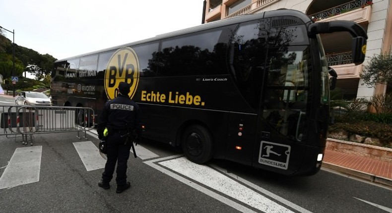 The Dortmund bus arrives under police escort at the Louis II stadium prior to their UEFA Champions League football match against Monaco, on April 19, 2017