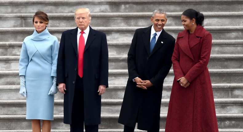 Melania and Donald Trump share a moment with Barack and Michelle Obama at Trump's inauguration ceremony in January 2017.
