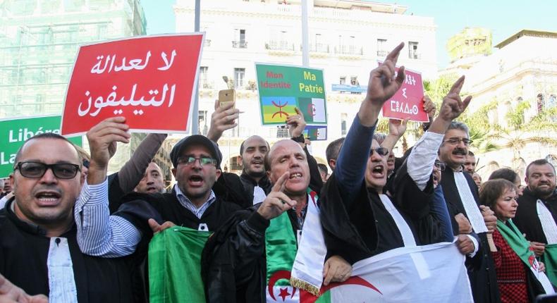 Lawyers take part in a demonstration demanding the independence of the judiciary system in Algiers on October 24, 2019