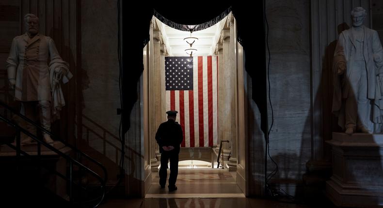 A U.S. Capitol Police officer stands at the door of the Capitol Rotunda near where the late U.S. Capitol Police officer Brian Sicknick will lie in honor Tuesday, Feb. 2, 2021, in Washington.
