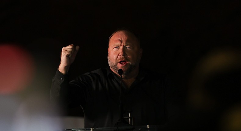 Alex Jones' Infowars empire is up for sale, but the conspiracy theorist hopes to stay on the air.Anadolu/Getty Images