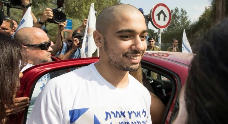 Israeli soldier Elor Azaria, who was convicted of manslaughter for shooting dead a prone Palestinian assailant, arrives at the Tserifin military base to begin his 18-month prison sentence on August 9, 2017