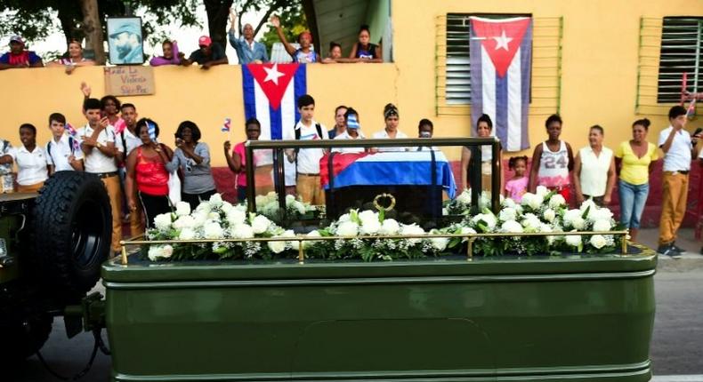 The urn with the ashes of Cuban revolutionary leader Fidel Castro leaves Revolution Square in Santiago, on December 4, 2016