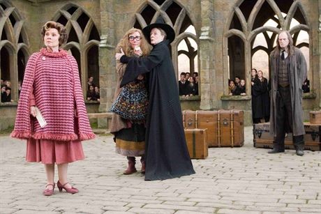 (L-r) IMELDA STAUNTON as Dolores Umbridge, EMMA THOMPSON as Sybil Trelawney, MAGGIE SMITH as Minerva McGonagall and DAVID BRADLEY as Argus Filch in Warner Bros. Pictures' fantasy 'Harry Potter and the Order of the Phoenix.'PHOTOGRAPHS TO BE USED SOLELY FOR ADVERTISING, PROMOTION, PUBLICITY OR REVIEWS OF THIS SPECIFIC MOTION PICTURE AND TO REMAIN THE PROPERTY OF THE STUDIO. NOT FOR SALE OR REDISTRIBUTION