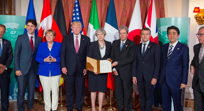 (L_R) European Council President Donald Tusk, Canadian Prime Minister Justin Trudeau, German Chancellor Angela Merkel, US President Donald Trump, British Prime Minister Theresa May, Italian Prime Minister Paolo Gentiloni, French President Emmanuel Macron, Japanese Prime Minister Shinzo Abe and European Commission President Jean -Claude Juncker during the G7 summit on May 26, 2017 in Taormina, Italy.