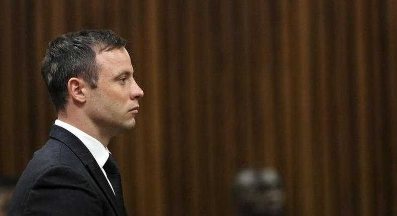 South African Olympic and Paralympic track star Oscar Pistorius attends his sentencing at the North Gauteng High Court in Pretoria October 21, 2014. REUTERS/Themba Hadebe/Pool