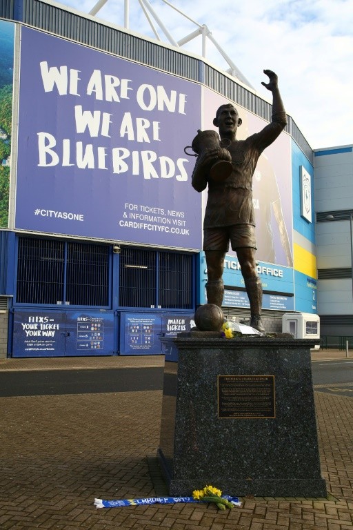 Flowers and scarves were left outside the Cardiff City Stadium as rescuers search for missing forward Emiliano Sala